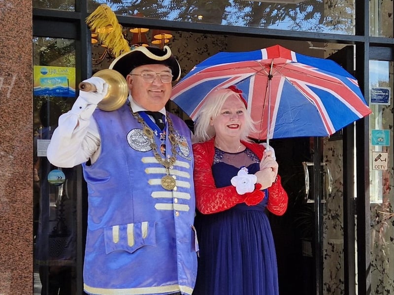 Worthing town crier Bob Smytherman with The Glamour Club founder Janice Moth