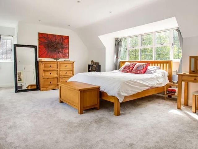 The first floor provides an impressive principal bedroom with built-in wardrobes, a large walk-in cupboard and an ensuite shower room. There are three further bedrooms with a family bathroom.