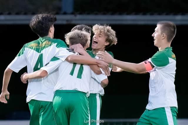 The young Rocks celebrate a goal against Godalming | Picture: Lyn Phillips