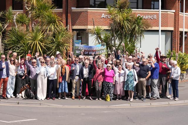 Protestors gathered outside the district council building in Littlehampton, before a committee refused plans for 190 new houses in Angmering. Photo: Eddie Mitchell