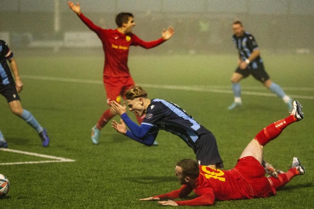 Action from a fog-hit Newhaven v Crowborough clash at Fort Road