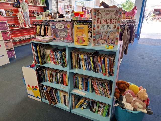 Inside Guild Care's new shop dedicated to children's toys, clothes and equipment, as influencer Jen Graham, known as Charity Shop Girl cuts the ribbon to officially open the Portland Road store