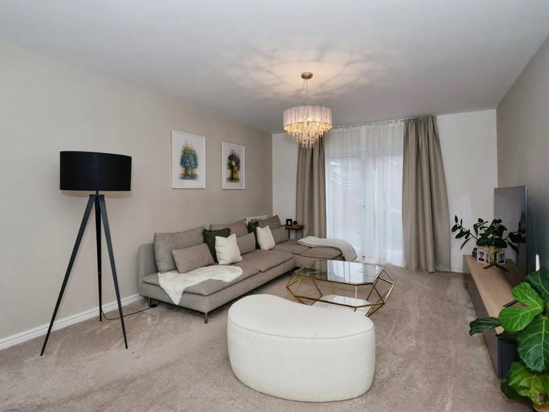 There is a double aspect sitting room downstairs