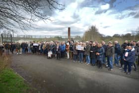 Public gathering by the gates of the Northeye site in Bexhill on Saturday April 1.