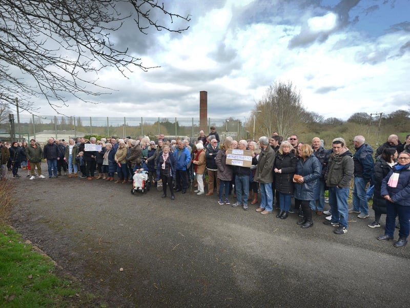 Public gathering by the gates of the Northeye site in Bexhill on Saturday April 1.