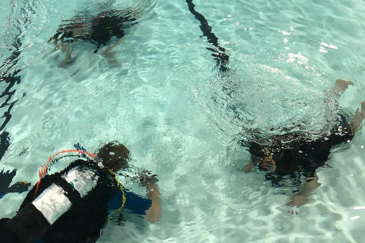 Students in Eastbourne 'take the plunge' with scuba diving qualification