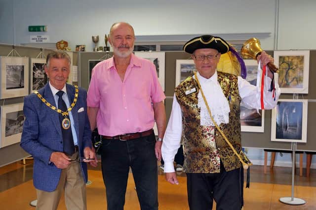 Mayor Paul Holbrook pictured with Hailsham Photographic Society Chair Bruce Broughton and Town Crier Terry Tozer. Photo: Hailsham Photographic Society and Hailsham Town Council