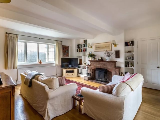 There are five reception rooms: a study, snug, sitting room, conservatory and a reading/music room