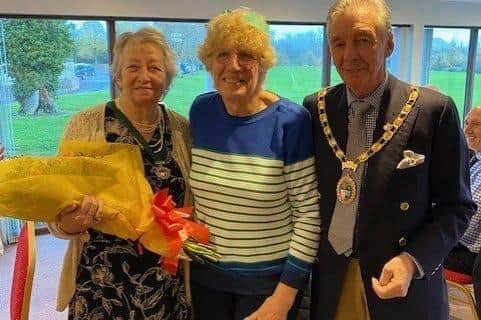 Geraldine Constable (centre) from Hailsham was awarded a BEM for services to the community in Hailsham and Eastbourne.