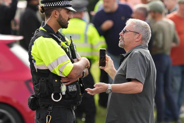 Protests take place outside the Chichester Park Hotel.