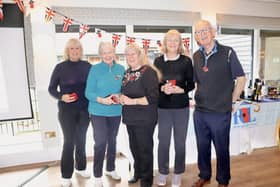 Joanne Dowzer (centre) presenting the winners of the Ladies competition with their prizes together with Andrew Ross, captain of Cottesmore Veterans.

