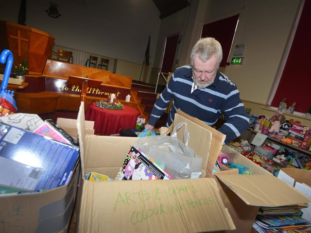 Surviving Christmas 2023 in Hastings on December 14: Packing and delivering hampers, and also sorting through the toys.
