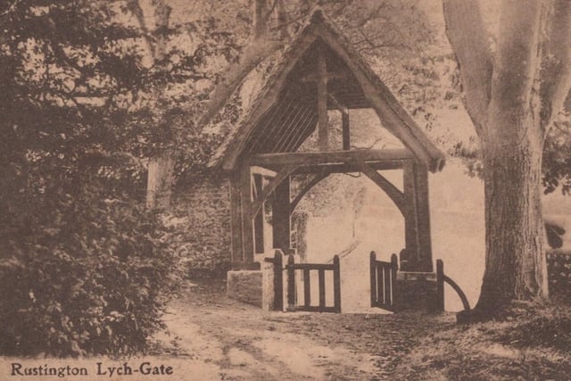 A postcard of the lych-gate at St Peter and St Paul Church