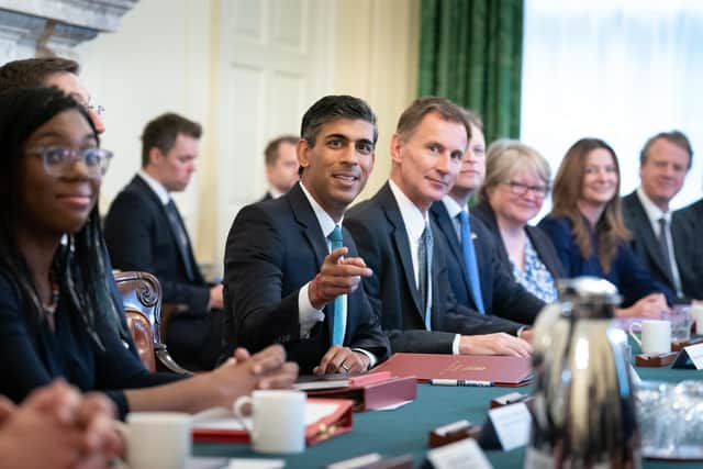 Rishi Sunak with his new cabinet pictured in late October (Photo by Stefan Rousseau - WPA Pool/Getty Images)