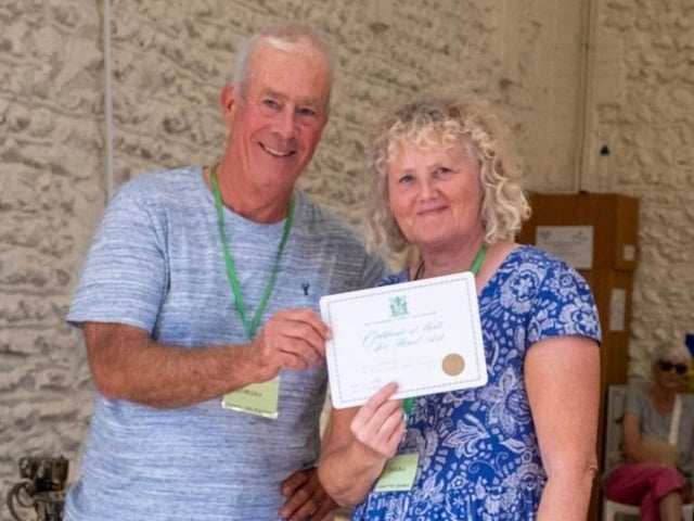 Chairman Chris Hill with Sarah Hill, who won the Floral Vase for floral arrangements and Worshipful Company of Gardeners Certificate for best floral arrangement