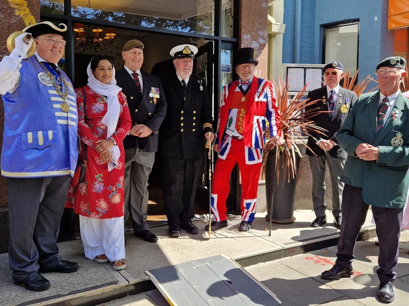 Worthing Veterans Association chairman Steve Hinton and vice-chairman Sid Hunt with, from left, Bob Smytherman, Henna Chowdhury, Noel Atkins and Sean McDonald