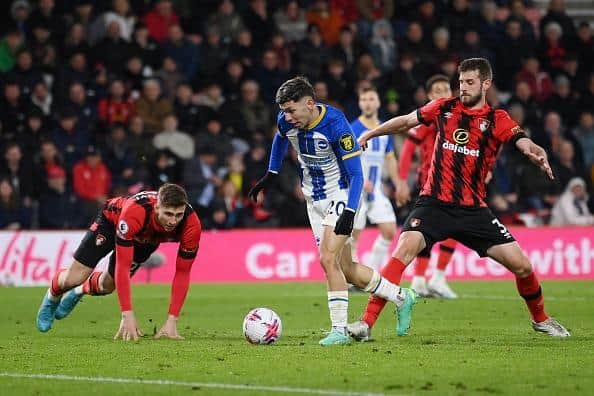 Brighton playmaker Julio Enciso evades Bournemouth defender Jack Stephens and slots home his first ever goal for the club