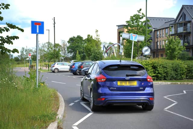 Drivers are using a Co-op car park off the old Broadbridge Heath bypass as a shortcut, although it's signposted as a dead end. Pic S Robards SR2305181