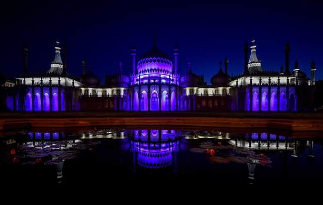 The Royal Pavilion in Brighton is lit up for Queen's Platinum Jubilee,  Credit Simon Dack / Alamy Live News