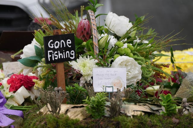 Many floral tributes reflected Winky's cherished hobbies.