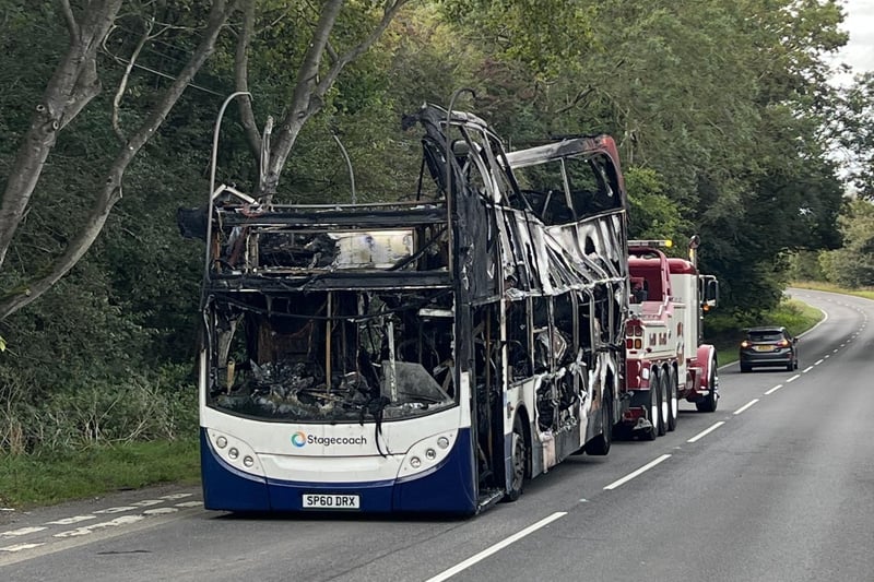 In Pictures: Bus fire in East Sussex village causes roundabout to close