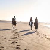 Horse riders at Camber Sands