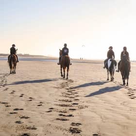 Horse riders at Camber Sands