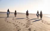 Horse riders at Camber Sands