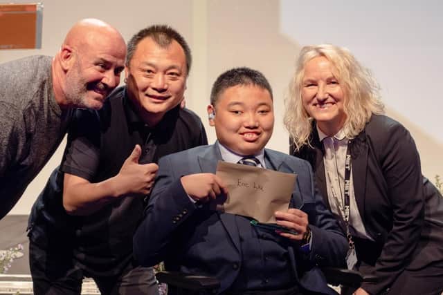Principal’s Choice winner Eric Liu with  his father, Helena Thomas and Jack the Lad