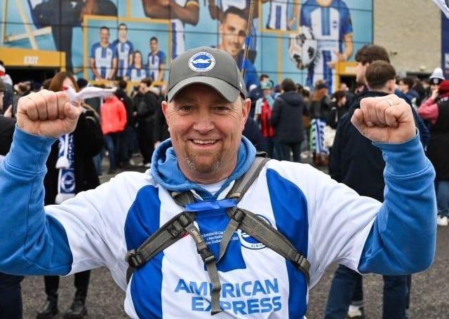 A Brighton fans carries inflatable seagulls as he arrives to attend the English FA Cup quarter-final football match between Brighton & Hove Albion and Grimsby Town at the Amex stadium in Brighton, on the south coast of England on March 19, 2023. (Photo by GLYN KIRK/AFP via Getty Images)