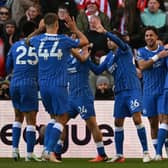 Brighton's players celebrate the opening goal in Saturday's win at Sunderland, which left them third in the table | Oli Scarff/ AFP via Getty Images