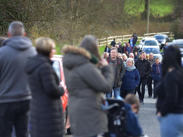 Public gathering by the gates of the Northeye site in Bexhill on Saturday April 1.