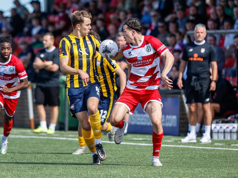 Action from Bath City's 2-1 win at Eastbourne Borough