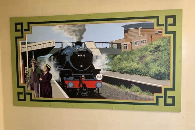 Artwork by artist Andrew Dandridge on display at Bishopstone station