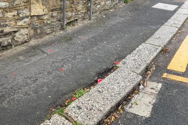 Broken kerb stone in Dudley Road