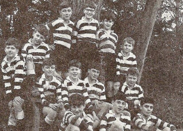 Boys gathering by the trees at Great Ballard School in the 1960s