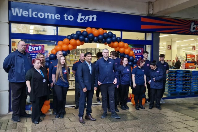 Store manager Marshall Almeida with staff ready to welcome customers to the new B&M in Worthing