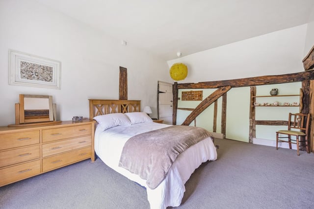There are four bedrooms on the upper floor and another in a self-contained annexe