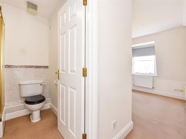 An ensuite bathroom in the property.