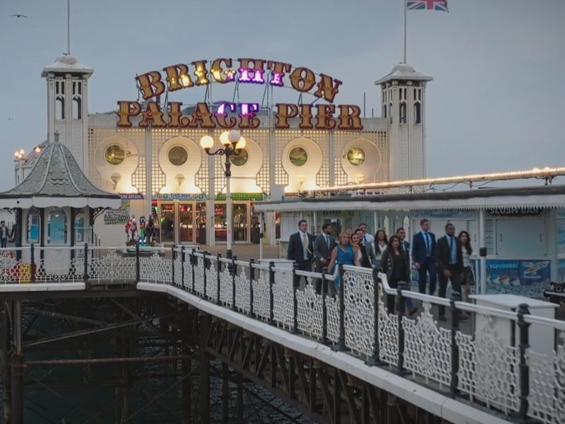 Mark, Sohail, Marnie, Victoria, Megan, Reece, Joe, Rochelle, Denisha, Dani, Avi, Bradley, Simba, Shazia, The candidates walk down Brighton Pier at the end of the task, Fremantlemedia Limited,N/A