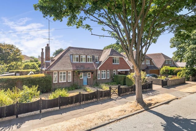 This substantial detached house boasts four/five double bedrooms, four reception rooms, a large, south-westerly facing rear garden, an integral garage and off-road parking. It is on the market chain-free with a guide price of £1.1million.