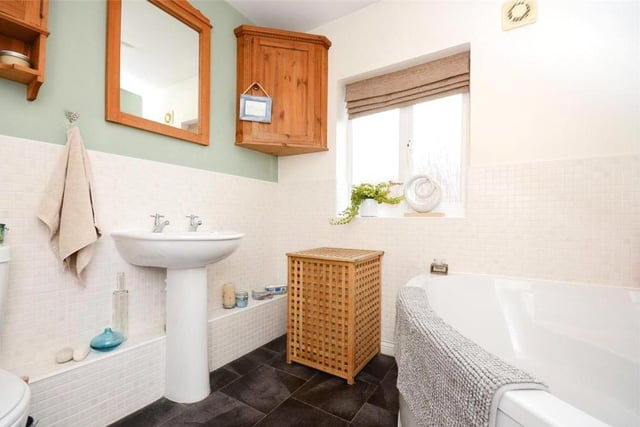 As well as the two en suites and the downstairs toilet, the Berry Hill Quarry property features this family bathroom on the first floor. Smart and stylish, it comprises a bath, wash hand basin, low-flush WC and storage space.