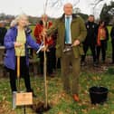 Andrew Griffith at a tree planting event in Slindon with Parish Council Chair Jan Rees
