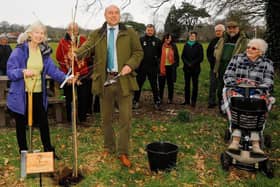 Andrew Griffith at a tree planting event in Slindon with Parish Council Chair Jan Rees