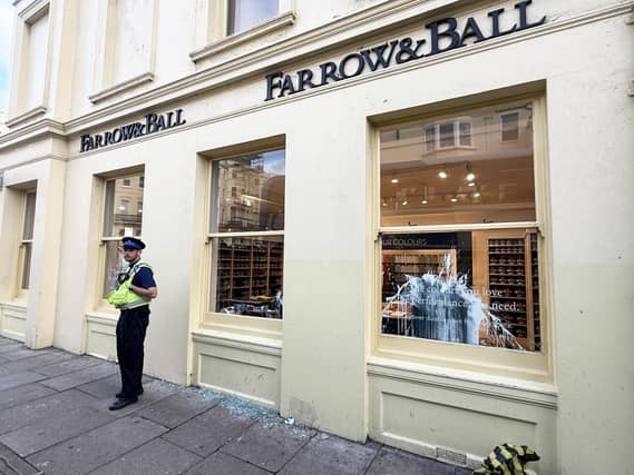 Police officers arrived in their numbers at the Farrow & Ball paint shop, in Western Road, on Wednesday afternoon (October 8).
