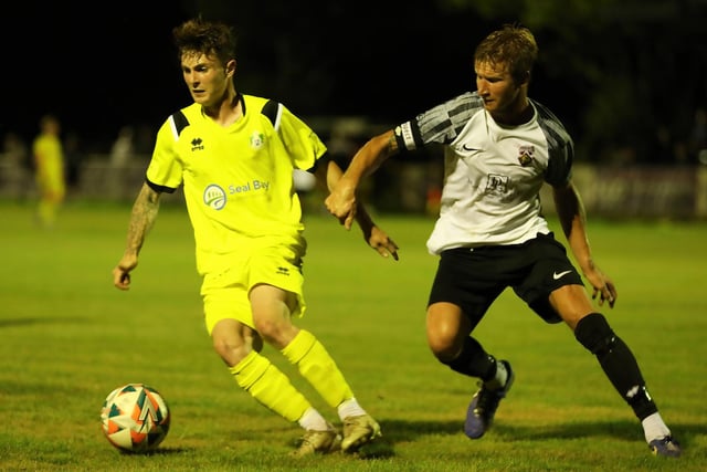 Selsey's Shane Brazil shields the ball from a Pagham defender in the Sussex Senior Cup