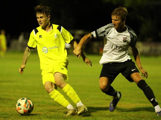 Selsey's Shane Brazil shields the ball from a Pagham defender in the Sussex Senior Cup