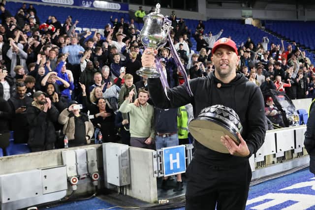 Adam Hinshelwood with the Sussex Senior Cup - now the manager is looking forward to the challenge of the 2023-24 season | Picture: Mike Gunn