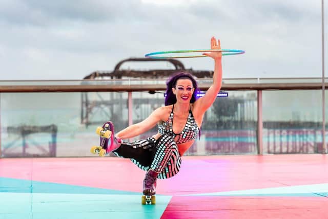 Kiki Hoola performing at Brighton i360 roller rink