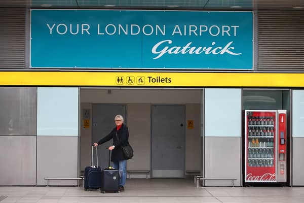 Gatwick Airport taxi drivers will protest outside a full Crawley council meeting to demand councillors do more to enforce licensing laws against Uber. Picture by Hollie Adams/Getty Images